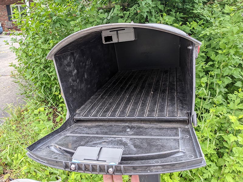 Ring Alarm Outdoor Contact Sensor installed in a mailbox for mail notifications