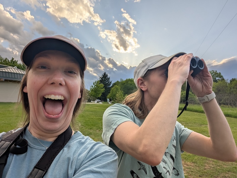 Libbie and Kyle spotting an Eastern Bluebird at the park