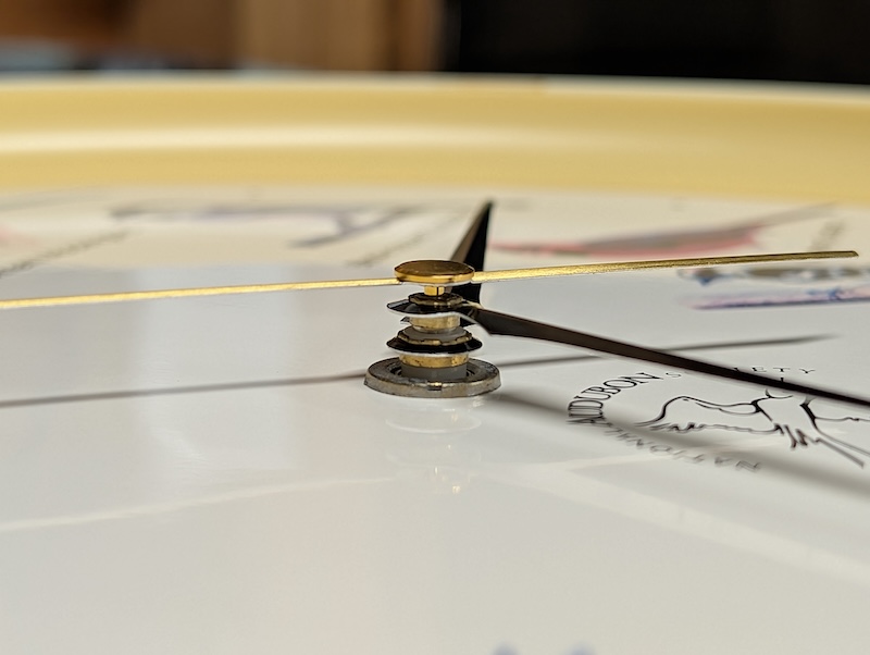 Original clock hands close-up on Audubon bird clock