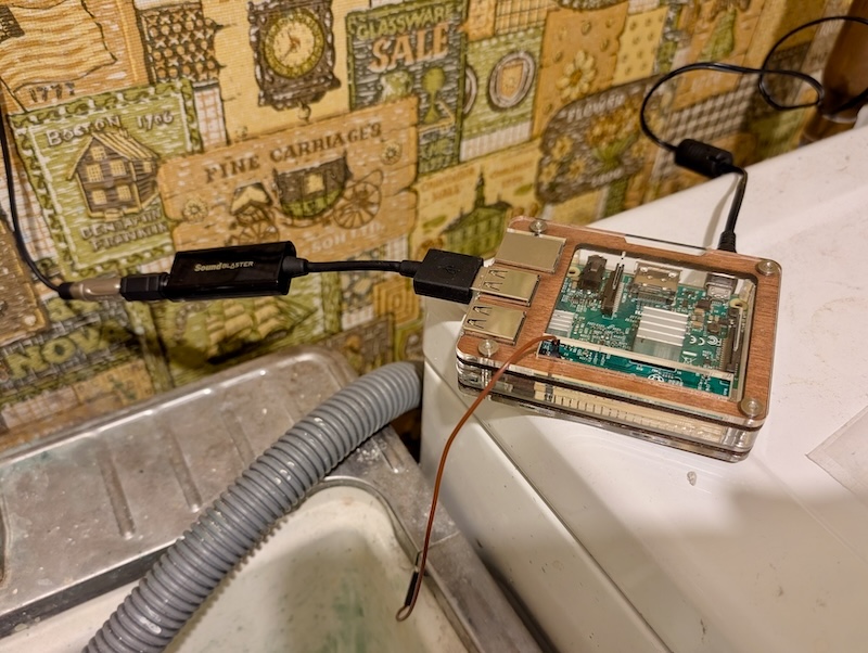 Raspberry Pi 2 with a temporary GPIO ground wire running to a sink